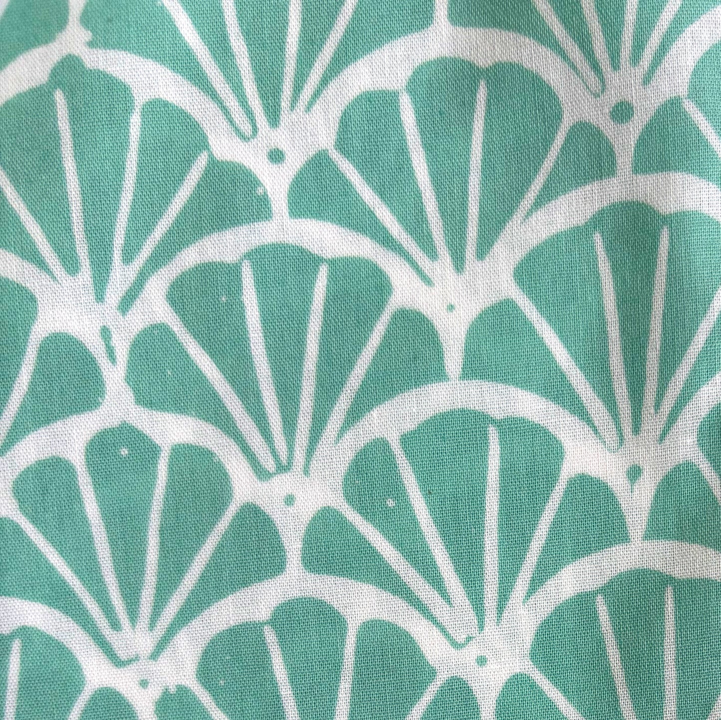 Close up of scallop motif