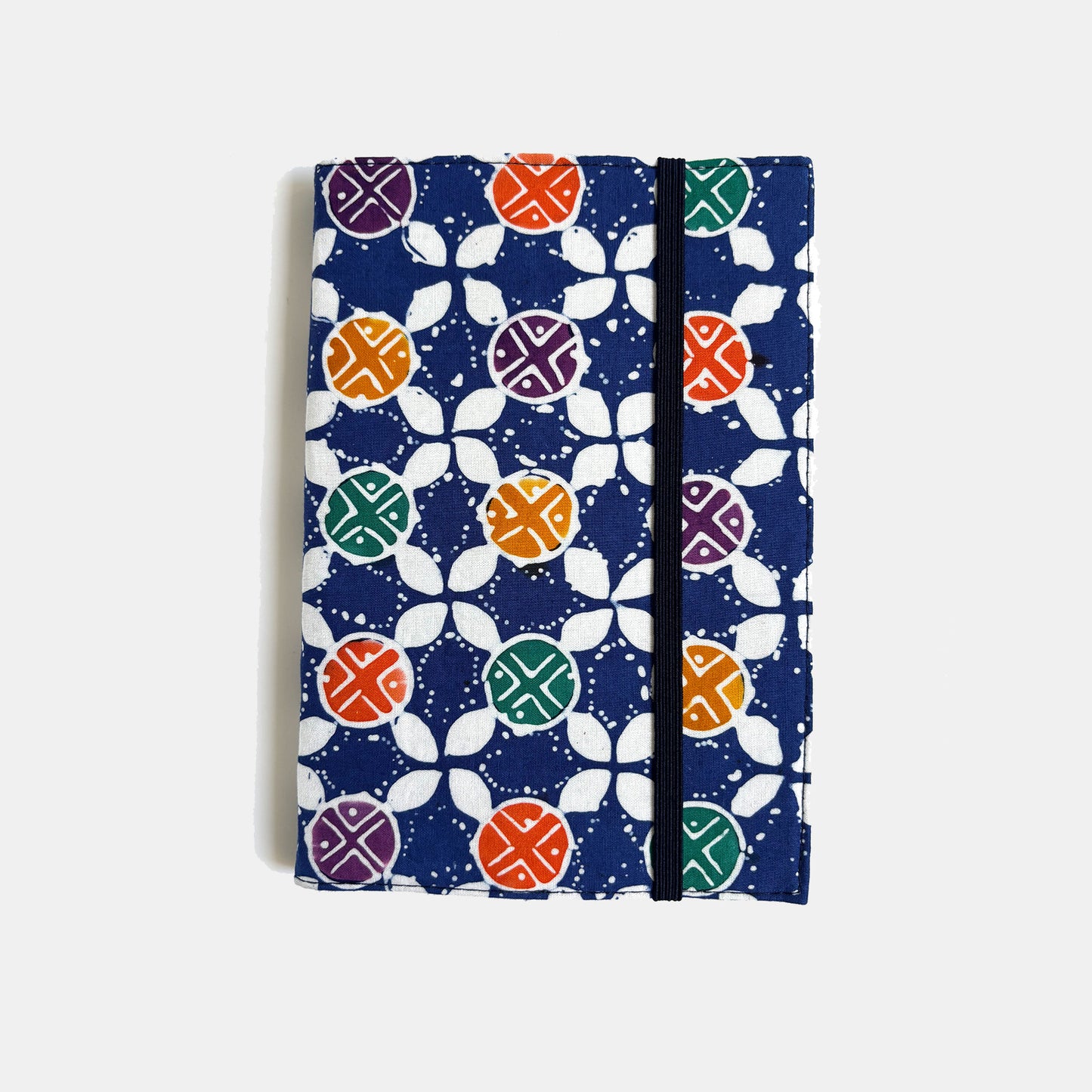 Notebook with a colorful geometric pattern on a white background