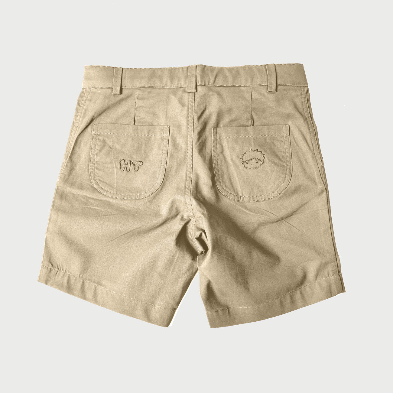 Back pockets of boys chino shorts