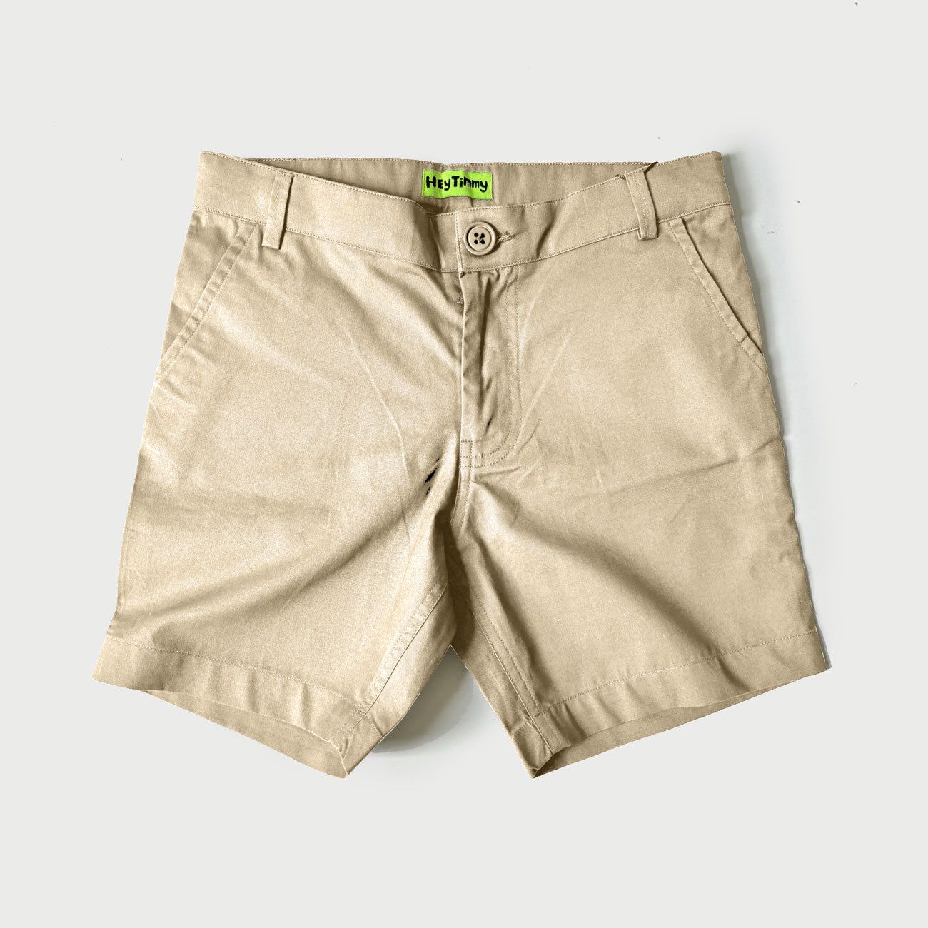 Flat lay of boys cream chino shorts