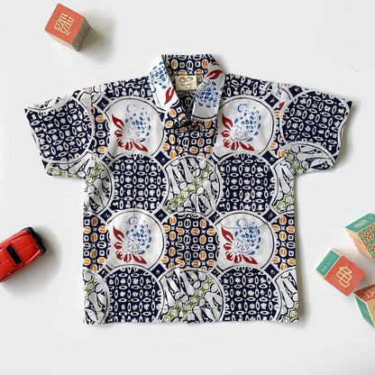 Flay lay of Sekar Jagad boy's batik shirt