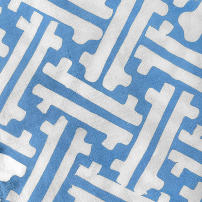 Close up of the handstamped lattice batik motif on cotton fabric