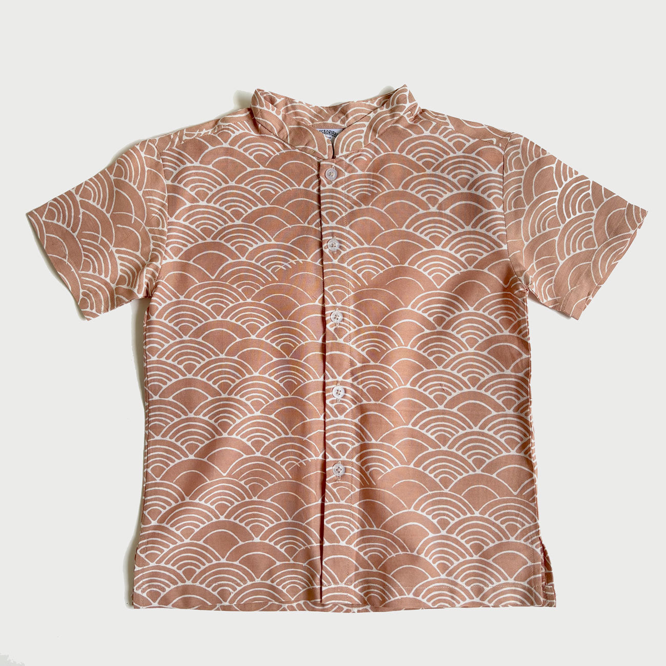 Flat lay of a batik shirt with the Japanese Seigaiha wave pattern