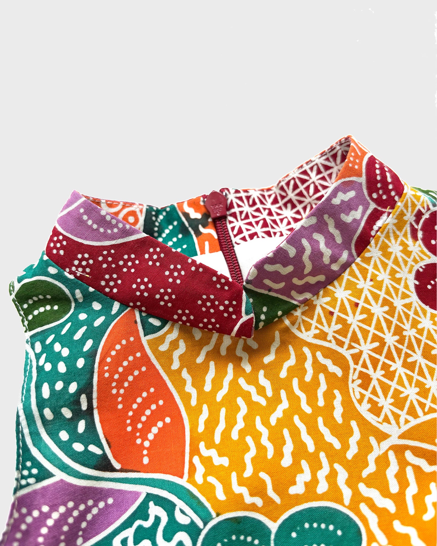 Mandarin collar of rainbow batik fabric  on a white background