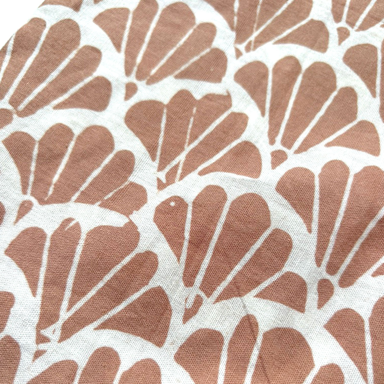 Close up of the scallop motif on a batik shirt