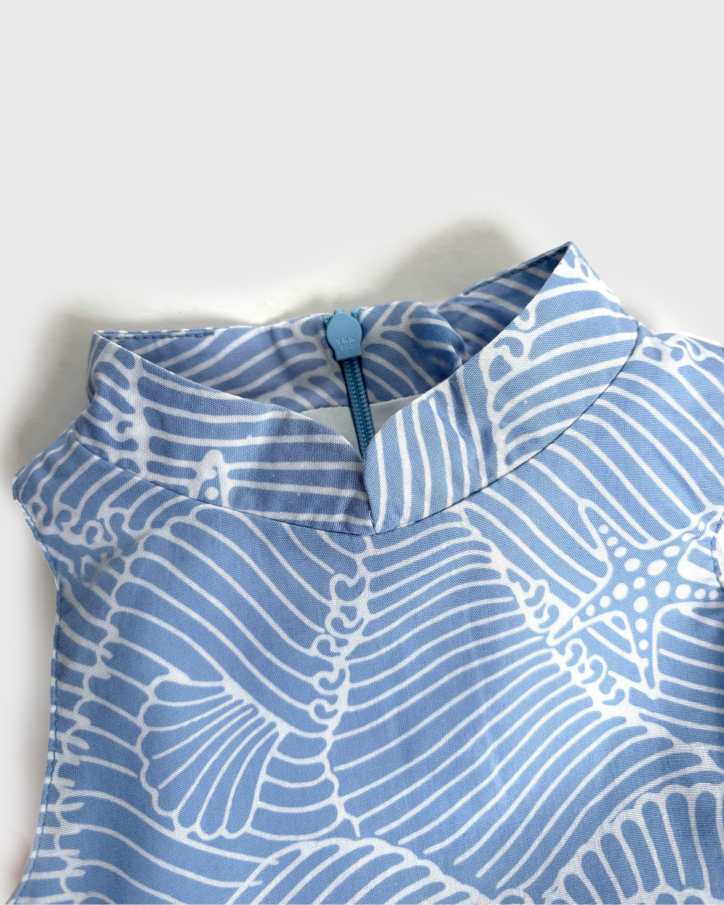 Mandarin collar of a blue batik dress