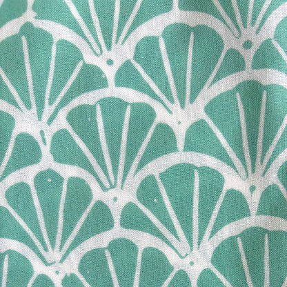 Close up of scallop motif