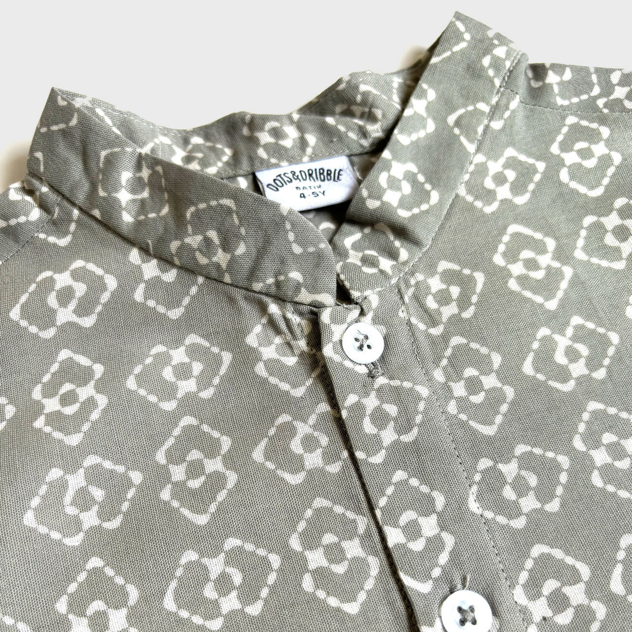 Mandarin collar of a gray batik shirt