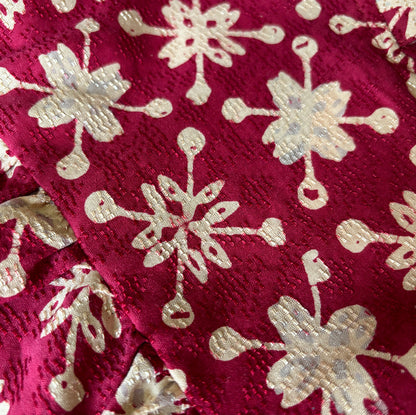 Close up of red and gold batik cotton