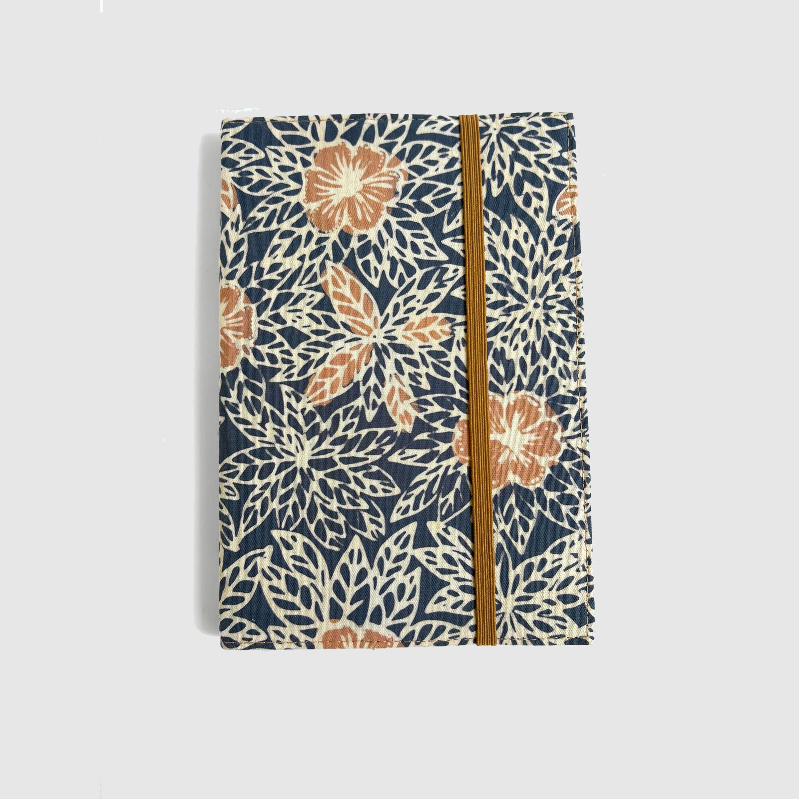 Notebook with floral pattern on a white background
