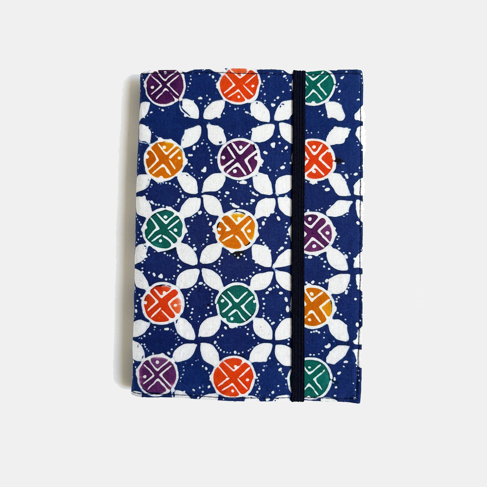 Notebook with a colorful geometric pattern on a white background