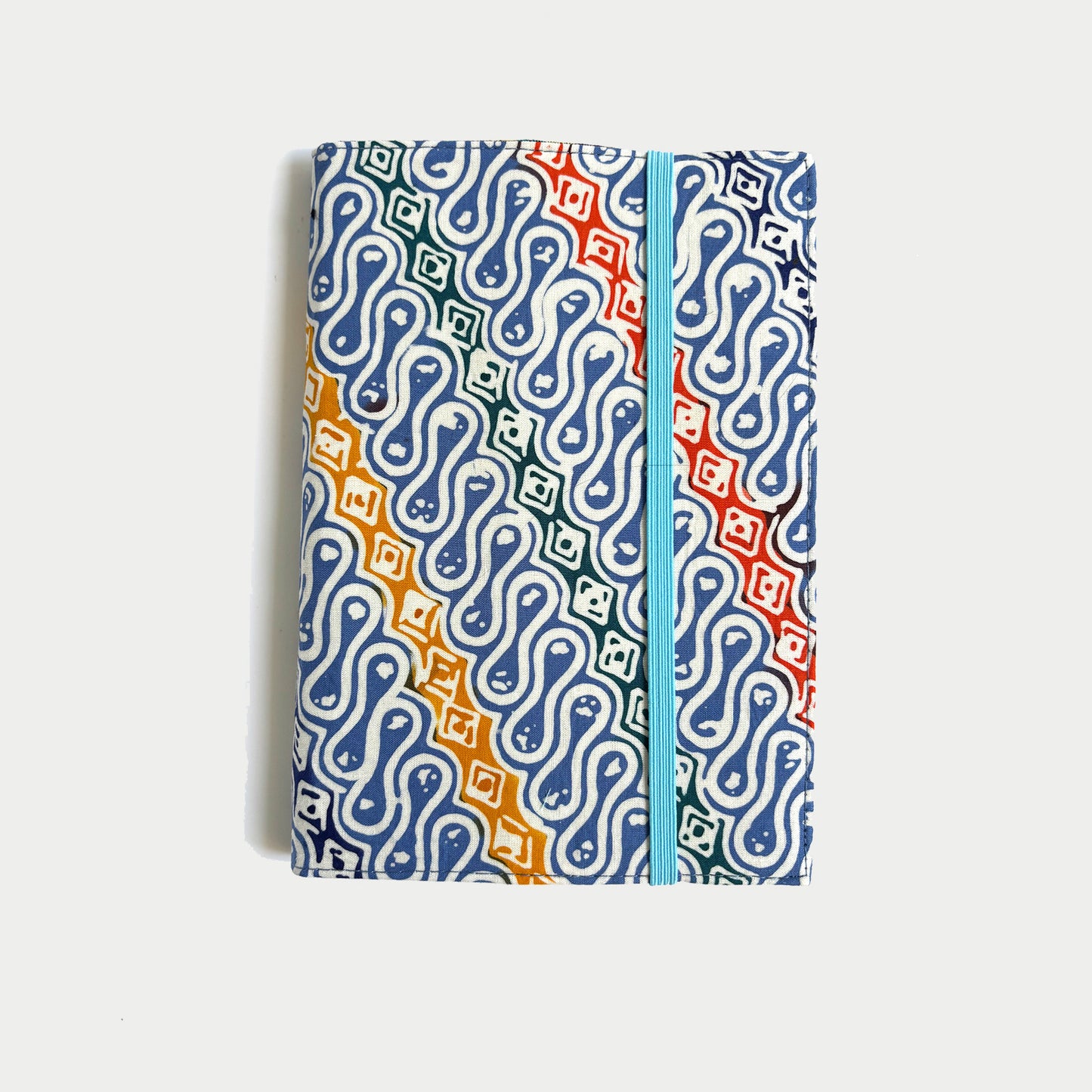 Notebook with a batik blue parang motif pattern on a white background