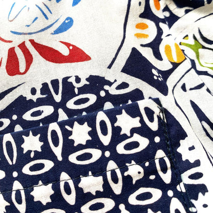 Details on a hand stamped batik shirt