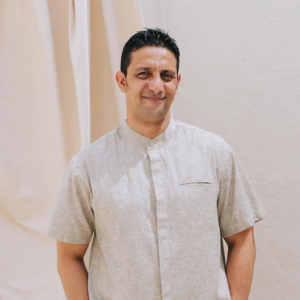 Dad wearing beige high collared shirt