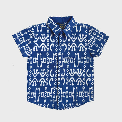 Flat lay of an ikat inspired hand-dyed batik shirt in navy blue